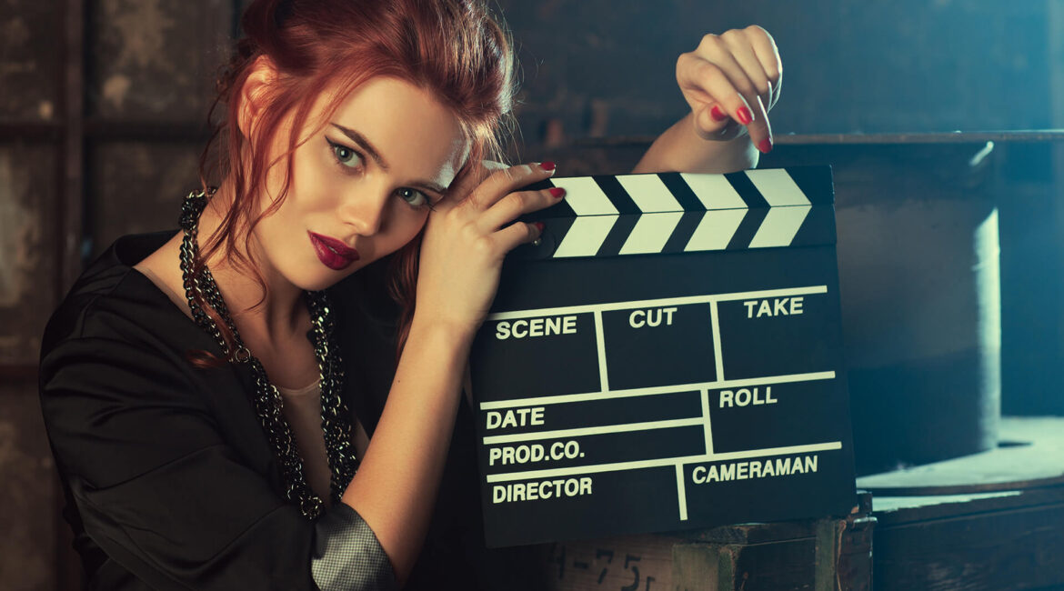 A girl with clapperboard